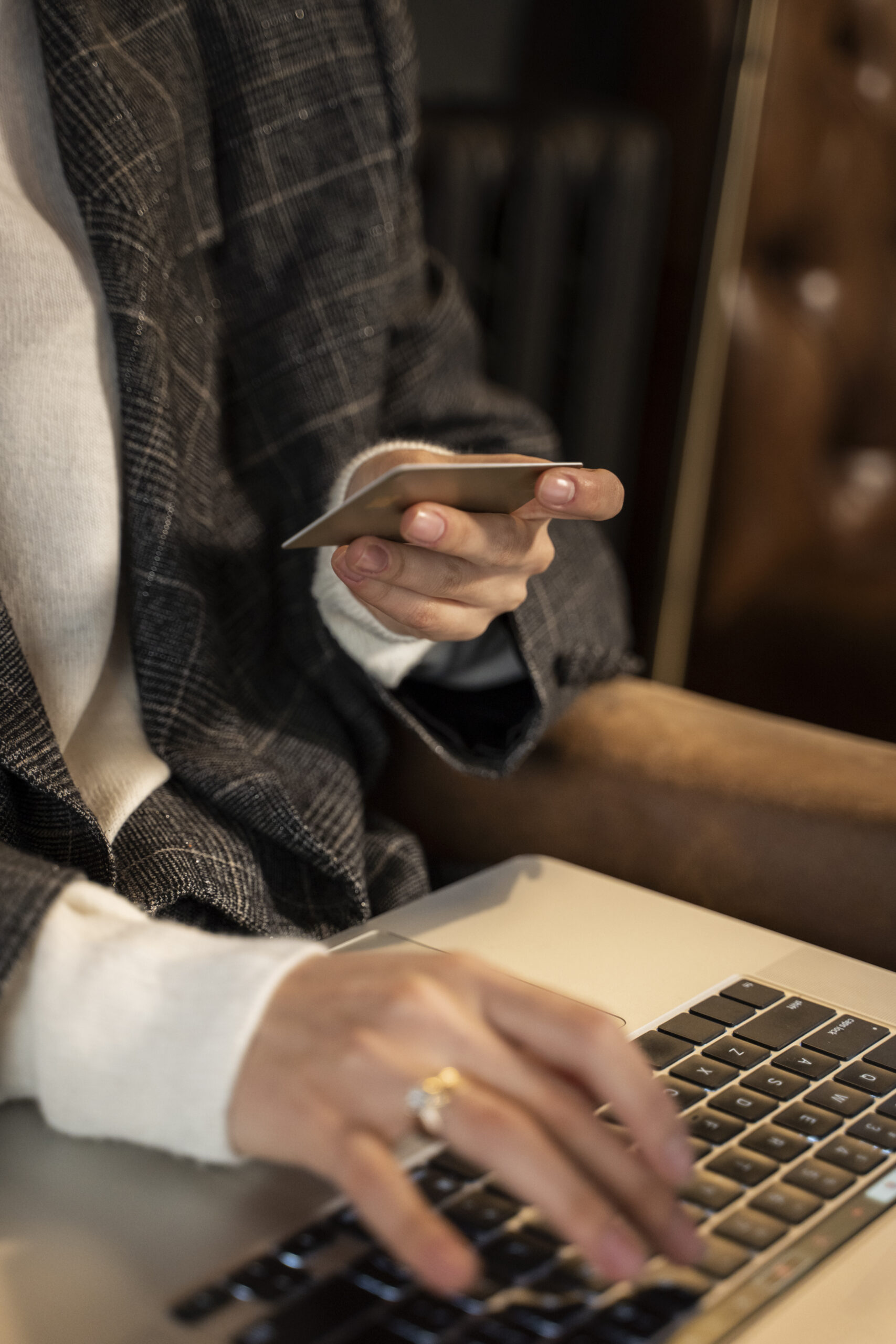 close-up-hand-holding-card-online-shopping